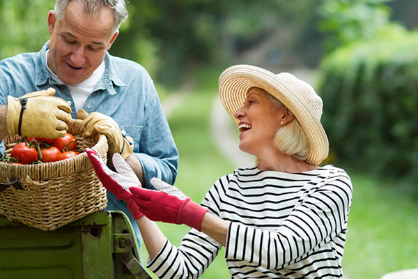 man and woman gardening