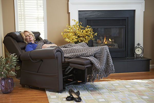 woman sleeping in a recliner